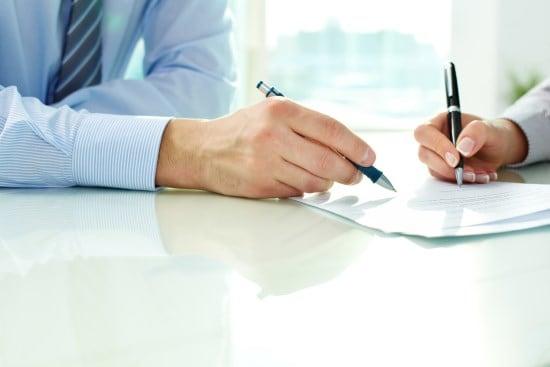 People doing paperwork People doing paperwork